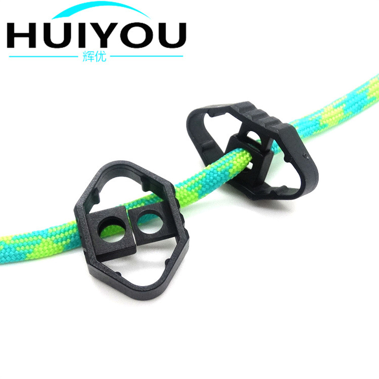 Manufacturers supply elastic dislocation double hole rope clip plastic durable spring rope buckle clothing accessories adjustment buckle