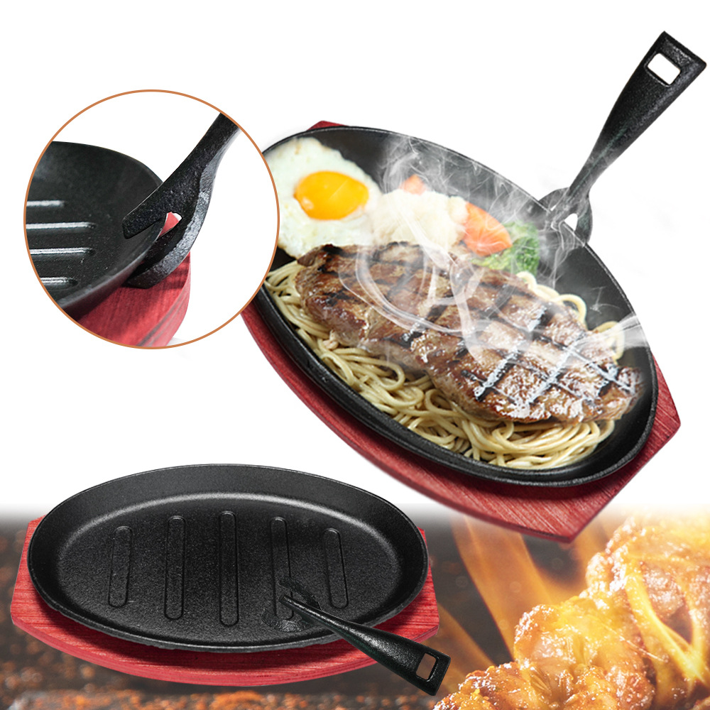 Foreign trade supply manufacturers directly supply cast iron egg-shaped iron plate non-stick baking tray cover rice plate steak striped baking tray waist plate
