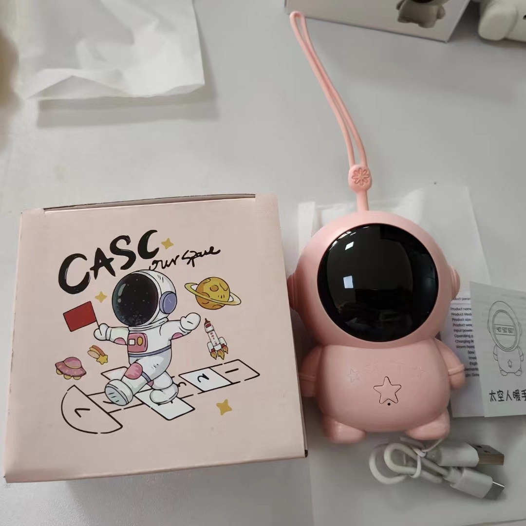 Net red astronaut hand warmer USB astronaut warm baby cartoon cat claw hand warmer wholesale electric portable belt