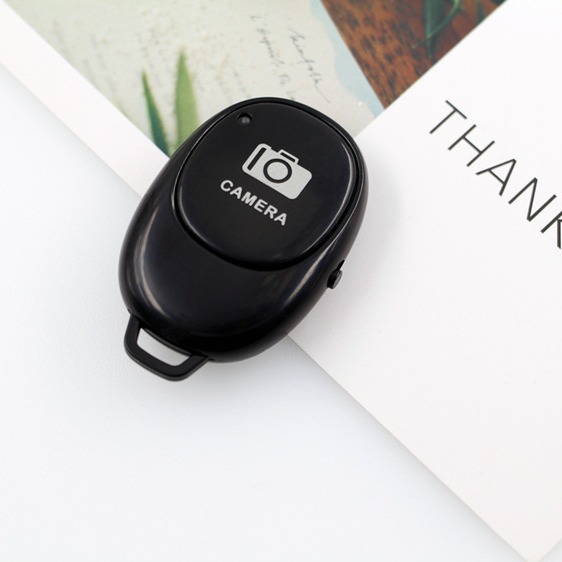 Cross-border hot selling Bluetooth remote control multi-function charging Android IOS mobile phone selfie device video shutter controller