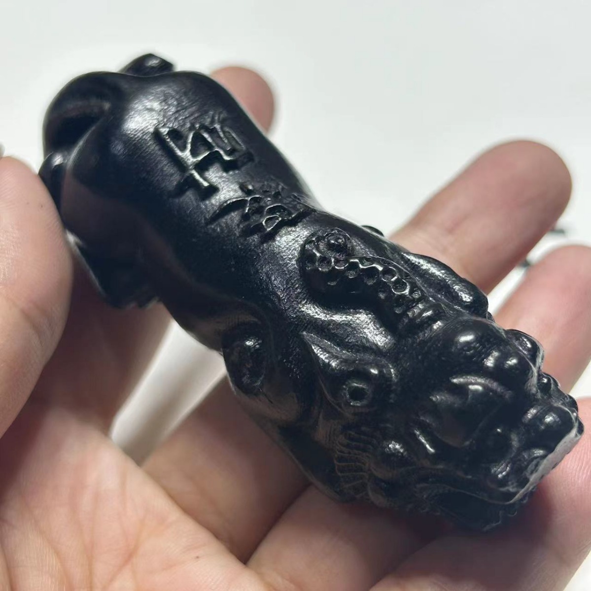 A variety of leather black wood hand pieces ebony wood carving ornaments craft gifts solid wood carving brave health care ball and other wholesale