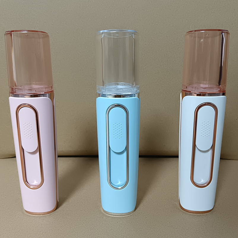 Double hole spray hydrating instrument handheld portable USB rechargeable facial moisturizing beauty instrument mini cold spray humidifier
