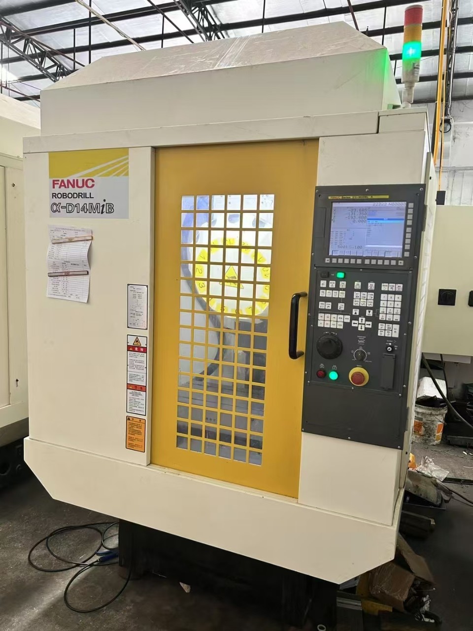 Brand: Fanuc Small Yellow Machine System: 31I-Model a Tool Magazine: 14 Servo Tool Magazines