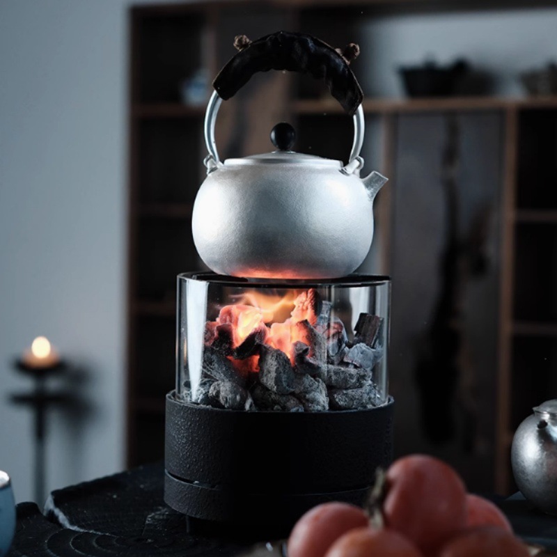 The stove can be watched for cooking tea by surrounding the stove. The fire can be closed. Glass charcoal stove indoor heating stove outdoor camping small tea stove tea maker