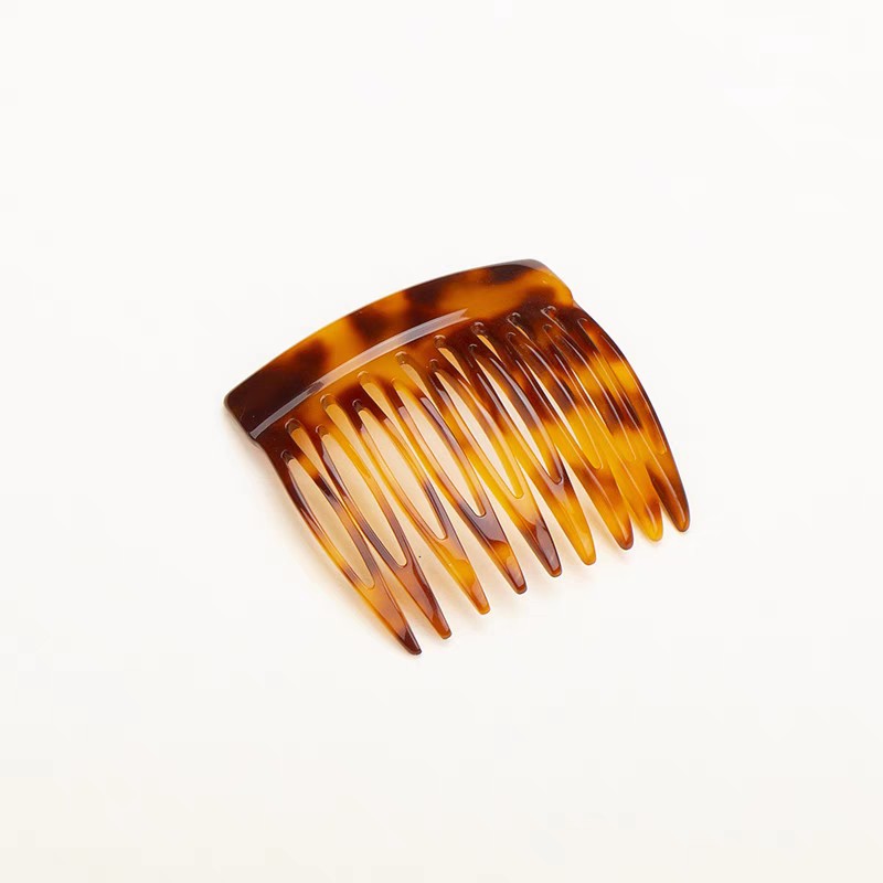 Europe and the United States hot new acetic acid hair comb fashion simple retro leopard print hair broken comb comb reverse comb