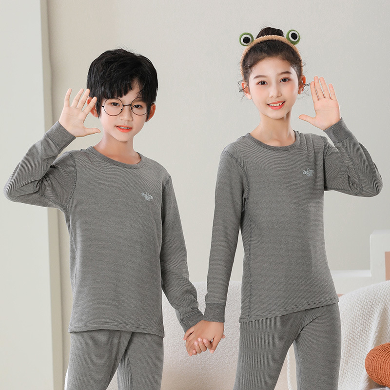 Children's one-piece autumn clothes top bottoming shirt German middle and big children warm thickened brushed autumn and winter velvet new wholesale underwear