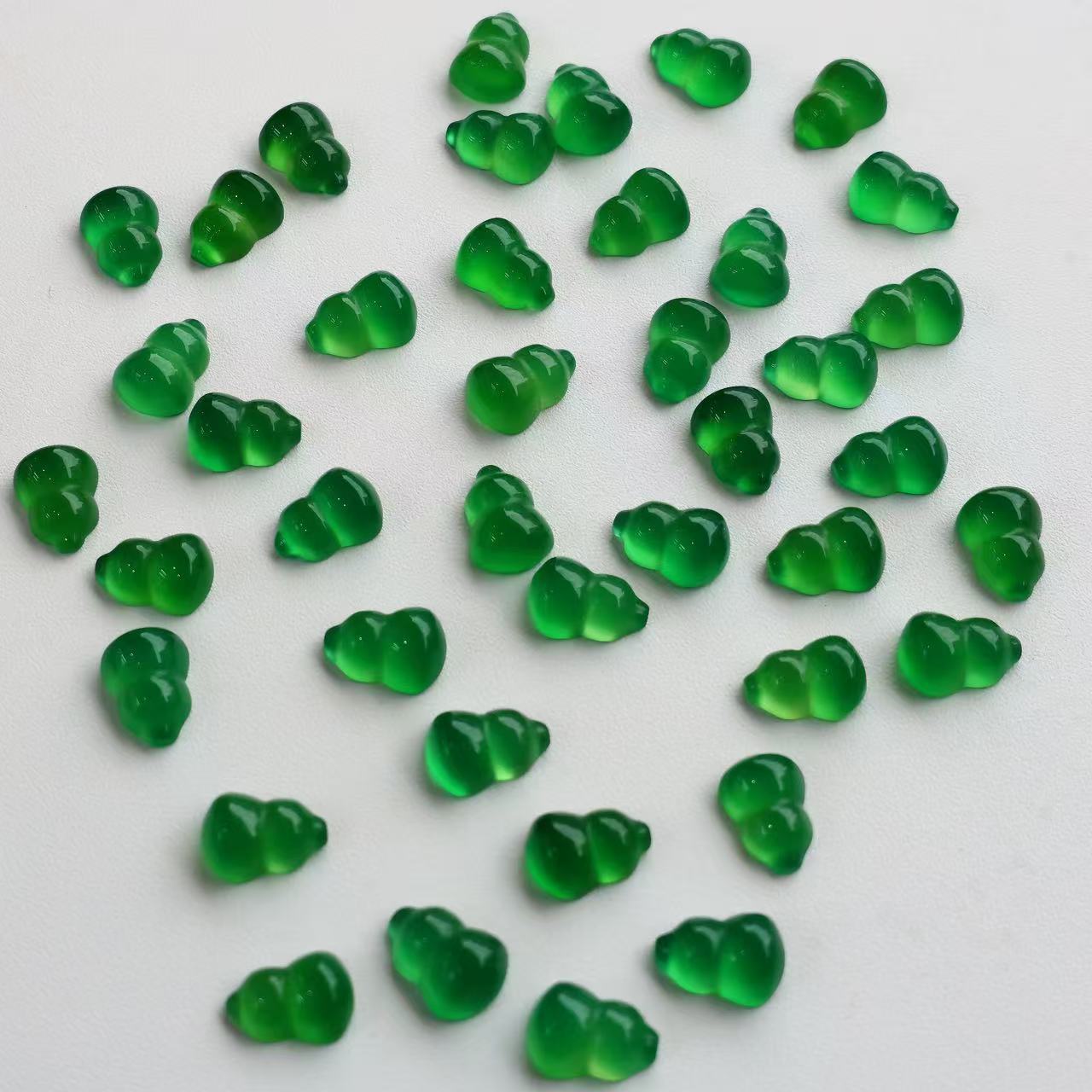 Natural green chalcedony flat bottom 7*9 gourd bracelet pendant bare stone carving craft accessories jewelry wholesale processing