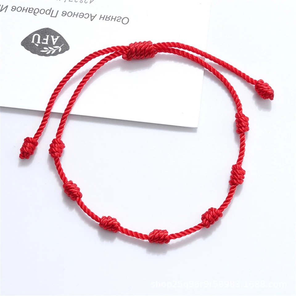 This year's best selling red rope seven knot lucky bracelet simple personality hand woven adjustable couple hand rope wholesale