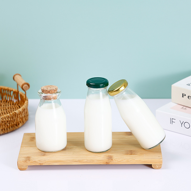 Wholesale 200ml transparent glass old yogurt bottle high temperature resistant fresh milk milk bottle jam pudding bottle printable logo