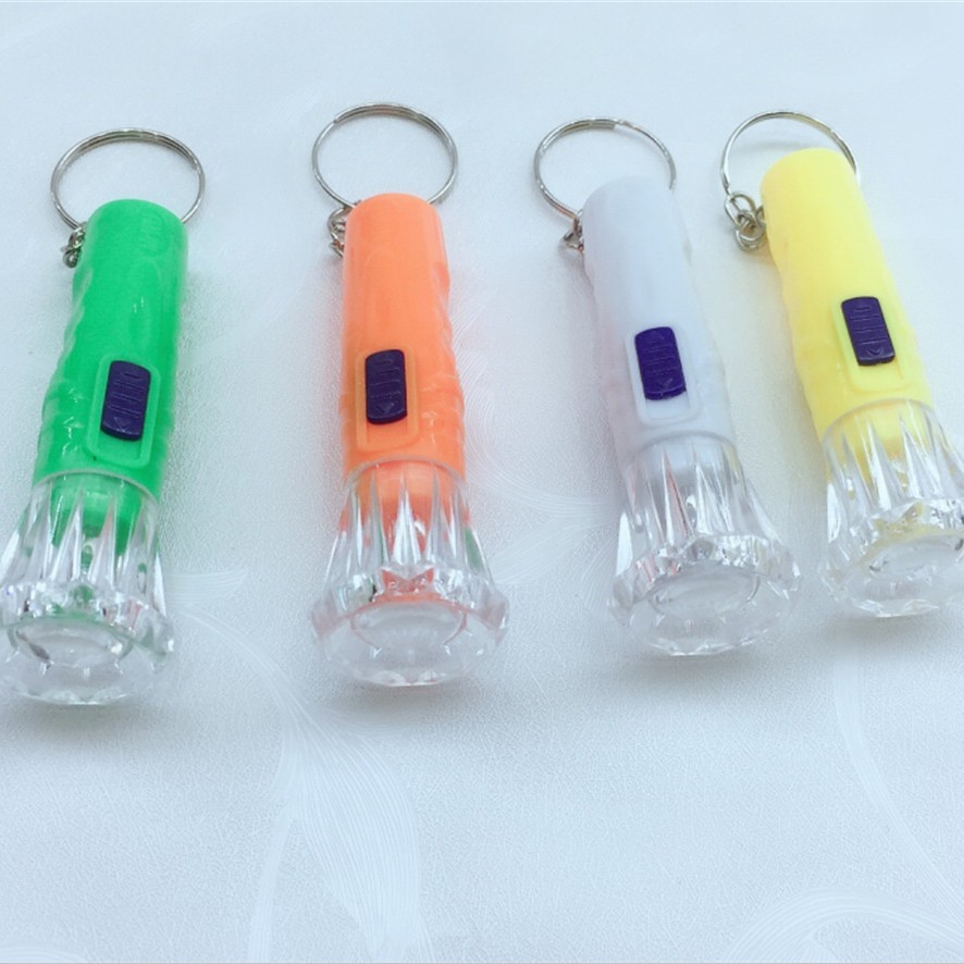 Factory direct 831 plastic fan strong light small flashlight wholesale LED outdoor keychain carrying creative flashlight wholesale