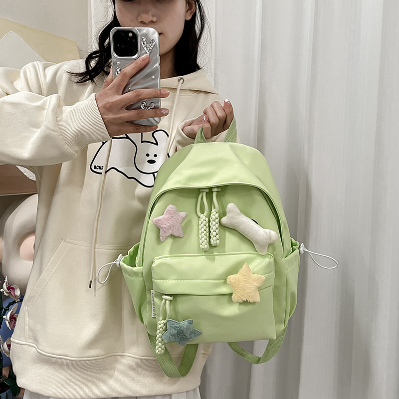 Schoolbag female middle school student college student simple all-match cute five-pointed star bone backpack female Fresh