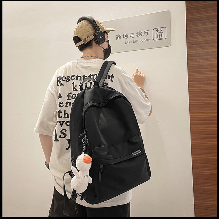 Backpack men's simple large capacity travel backpack women's casual Japanese junior high school student schoolbag men