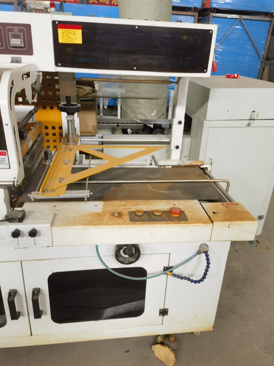 Processing Fully Automatic Heat Shrinking Machine, Film Sealing and Cutting Machine, L-Type Fully Automatic Sealing and Cutting Machine, Pof Shrink Film Type 450