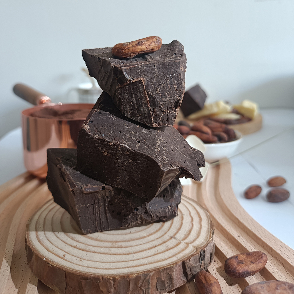 Wholesale Xingguang cocoa liquid block 52% fat-containing pure dark chocolate baking raw material ketogenic fitness sugar-free 15KG