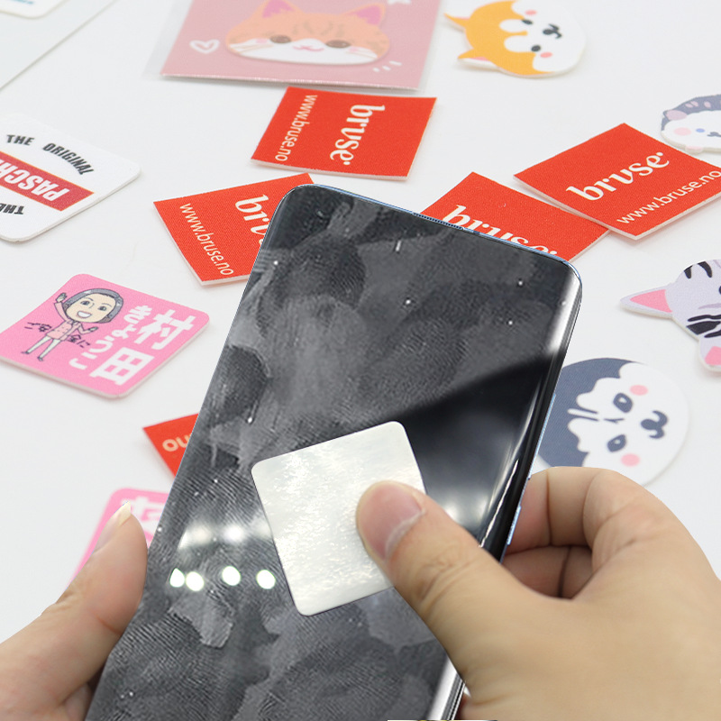 Aoqi factory wholesale custom mobile phone cleaning stickers special-shaped mobile phone stickers silicone fine fiber mobile phone wipe strong paste