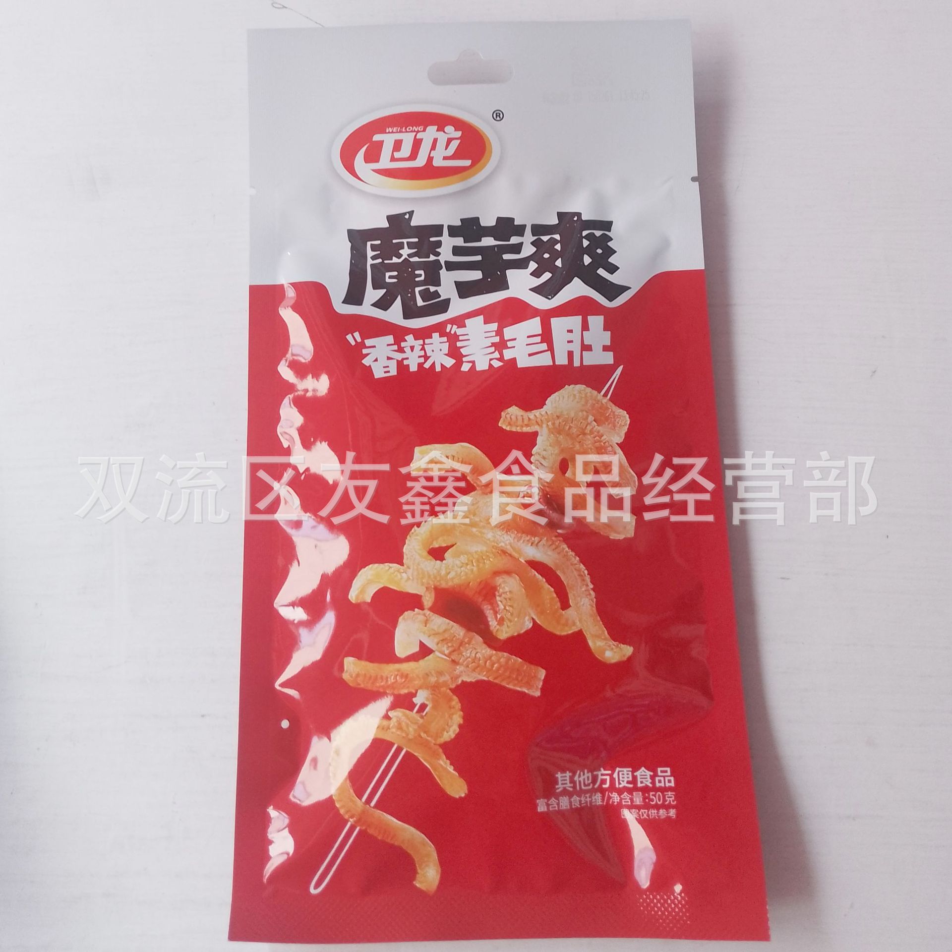 Weilong spicy strip konjac cool 50g spicy sour and spicy vegetarian belly/wind eating seaweed snacks wholesale full box of 60 bags