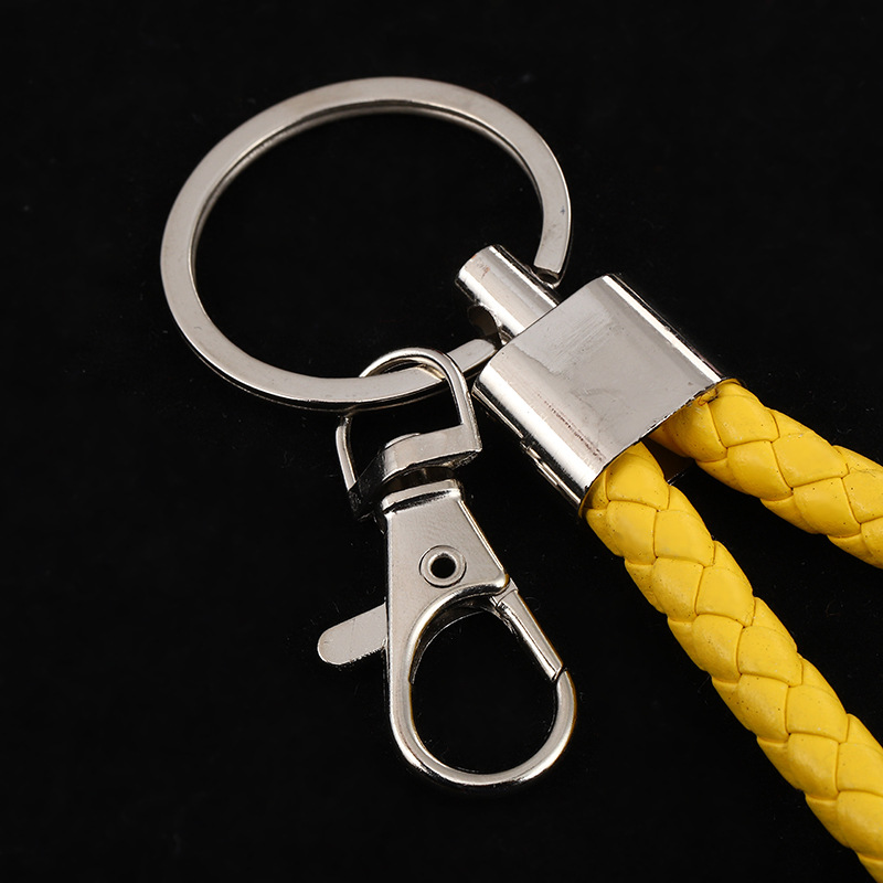 Spot wholesale woven leather rope keychain men's and women's DIY handmade car key accessories metal ring pendant decoration