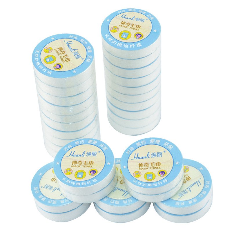 Hotel travel disposable compressed towel pure white absorbent portable non-woven face cleaning towel factory direct supply