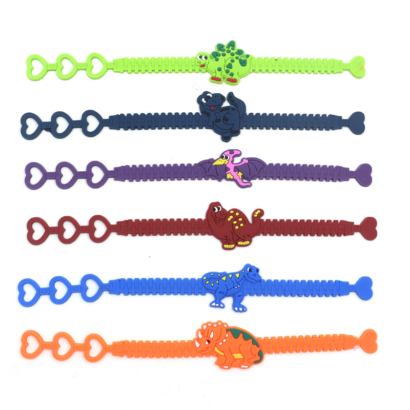 Cross-Border Factory Direct European and American three-hole adjustable dinosaur bracelet pvc cartoon wrist strap dinosaur children's bracelet