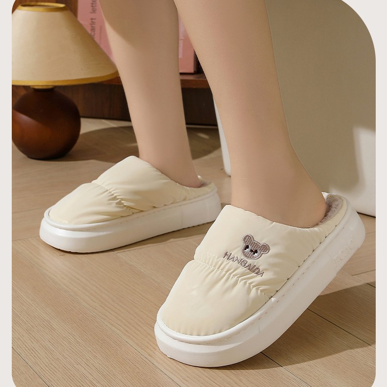 Down cloth waterproof cotton slippers women's new home mute thick-soled winter couples cotton slippers men wholesale outro