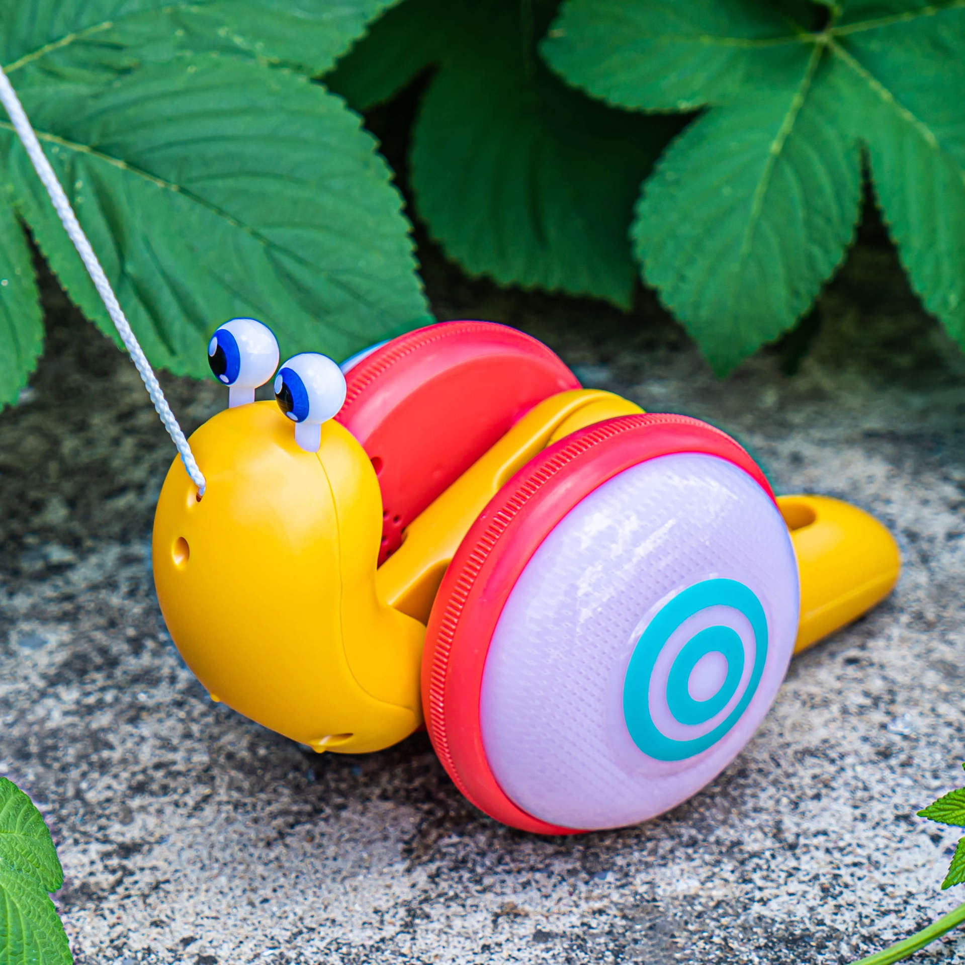 Children's pull rope drag snail night market creative fiber rope light music pull pull pull baby toddler toys wholesale