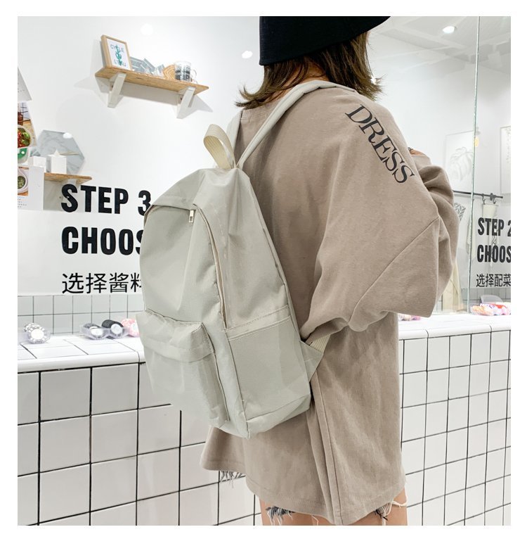 Manufacturer Wholesale Backpacks for Men and Women, College Style Oxford Cloth, Large Capacity Travel Backpacks for Middle School Students, Breathable and Wear-Resistant