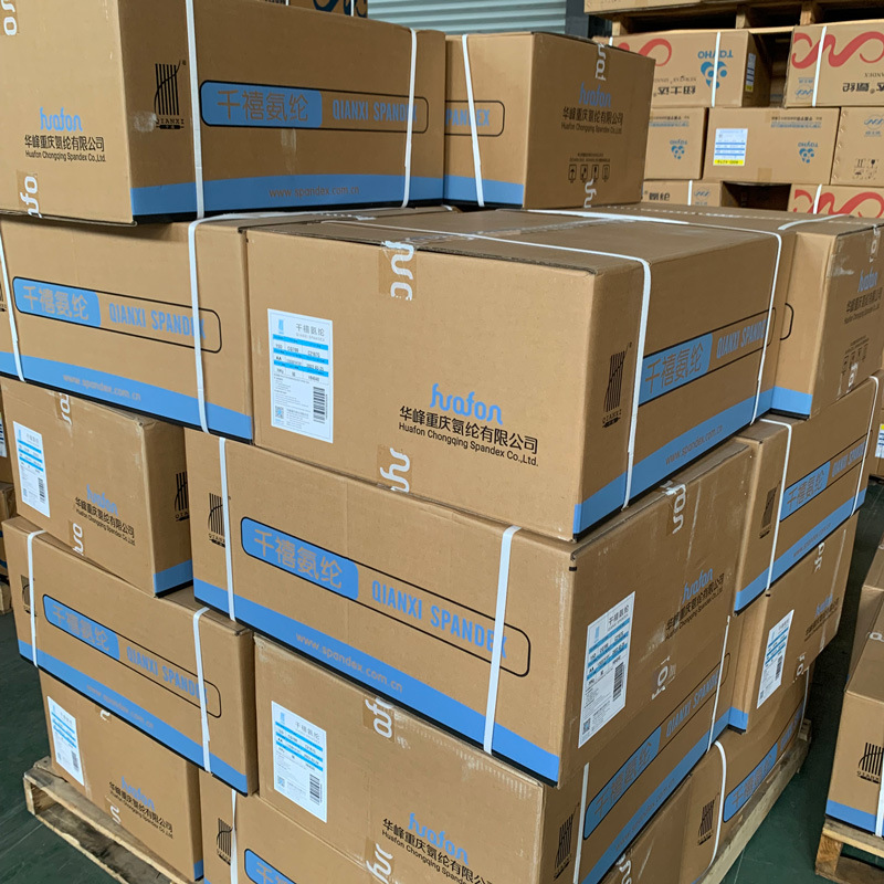 A box of huafon Millennium qianxi high temperature resistant 40D semi-light AA grade CQ600 white spandex yarn