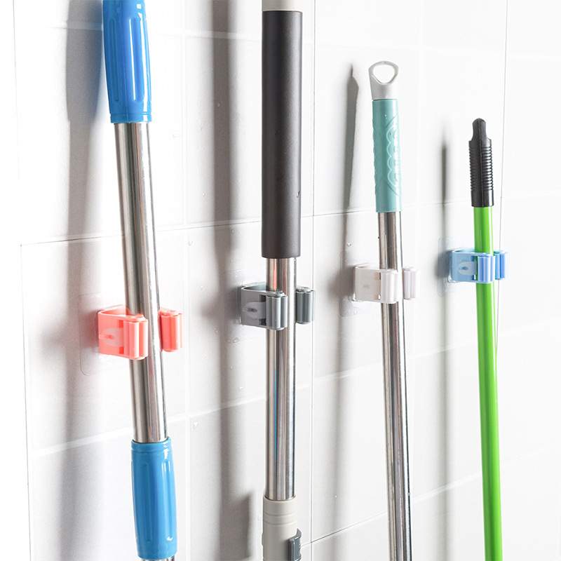 Mop rack punch-free strong mop clip hook wall-mounted mop buckle holder rack seamless stickers wholesale