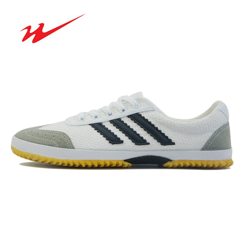 Qingdao double star men's and women's track shoes volleyball shoes can be used as football shoes flat bottom beef tendon bottom canvas breathable football shoes