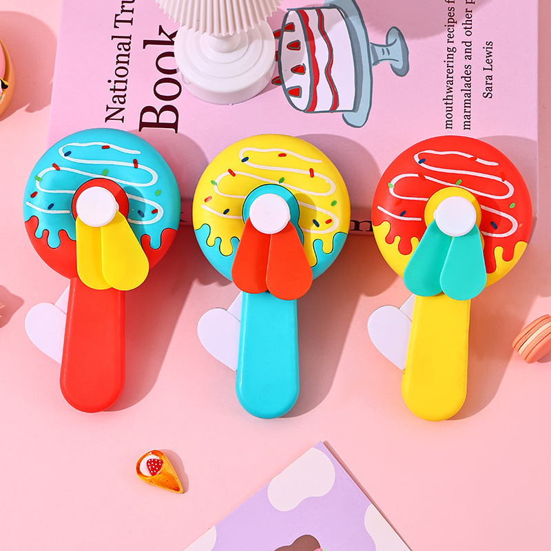 Children's cartoon hand pressure fan creative animal donut mini manual hand crank small fan school gifts wholesale