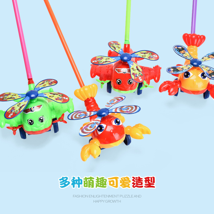 Baby toddler trolley toy single rod children push Music boys and girls hand push aircraft Pegasus lobster hot sale
