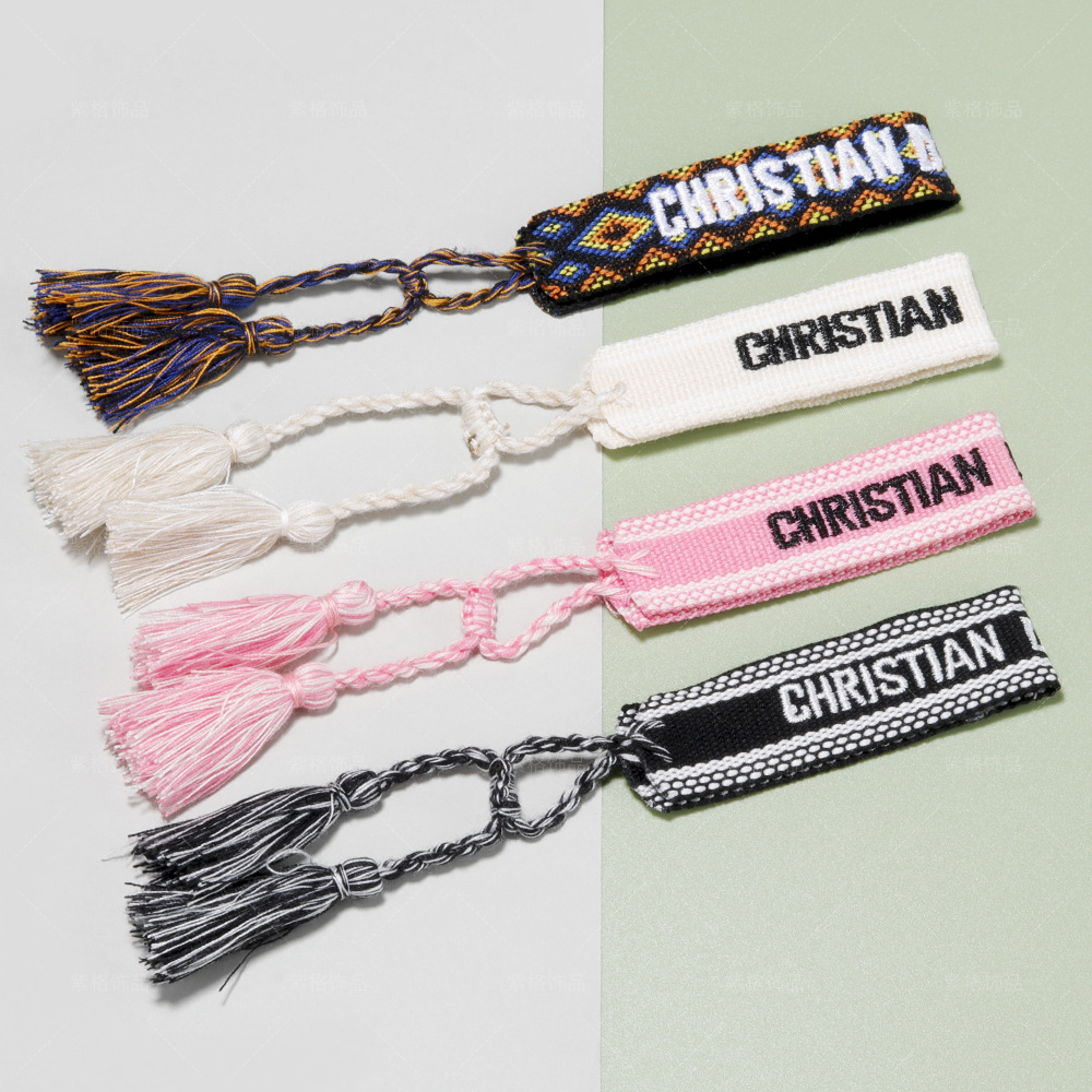 D home spot cotton embroidery wrist strap tassel woven bracelet women's bohemian letters European and American hand rope