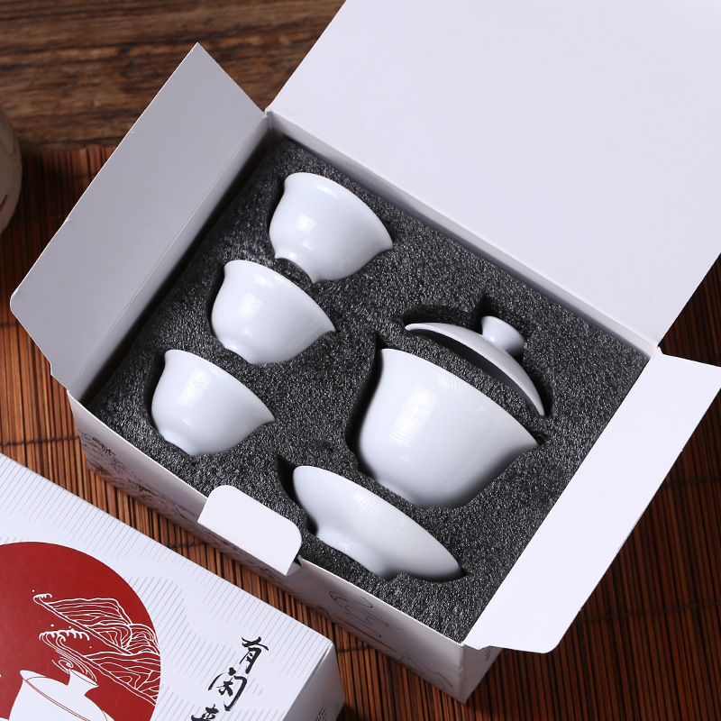 Factory wholesale kung fu tea set suit white porcelain three-cap bowl high white porcelain teacup ceramic portable tea set gift