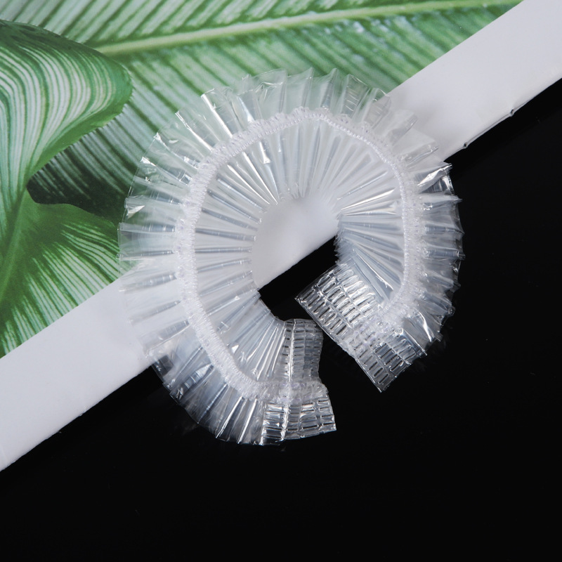 Spot disposable PE shower cap earmuffs plastic transparent thick high pressure bar shower cap bathroom hotel shower cap