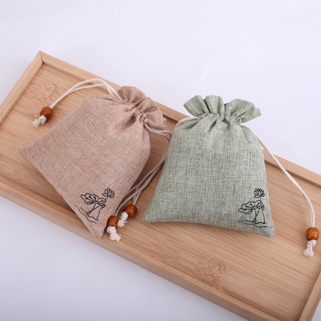 Factory direct supply linen bag text play beads bracelet jewelry packaging bag Lotus linen bag can be fixed LOGO