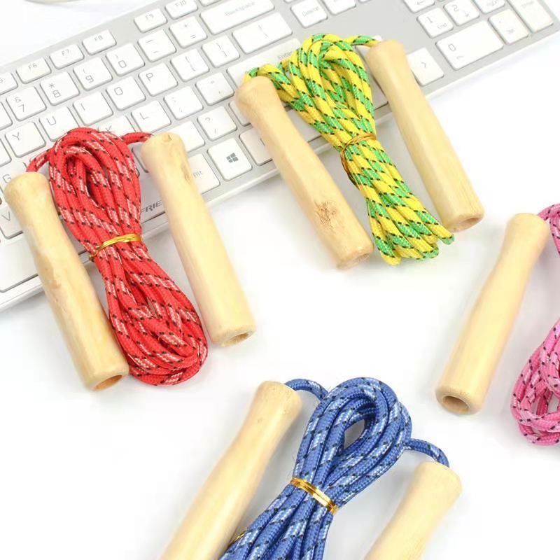 Wooden handle rope skipping children's game stall supply kindergarten gifts wholesale exercise cartoon wooden handle rope skipping