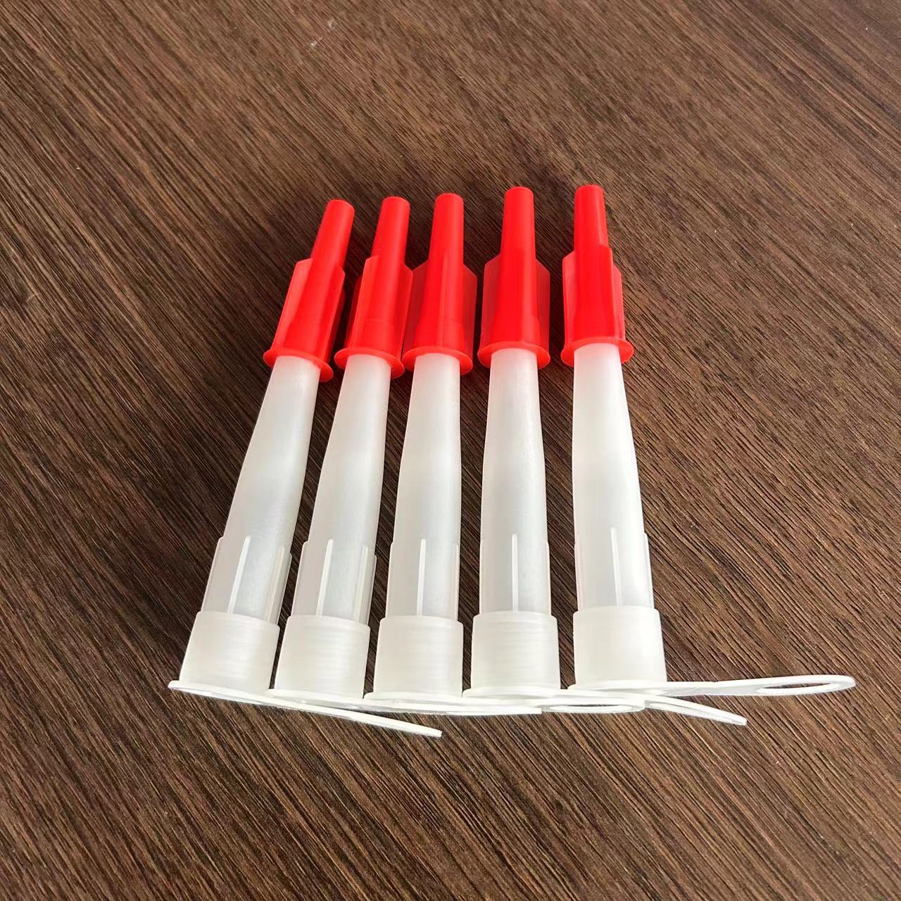 Manufacturers supply universal glass glue nozzle with Red Hat leak-proof and dry-proof hard tube glue nozzle plastic silicone glue nozzle