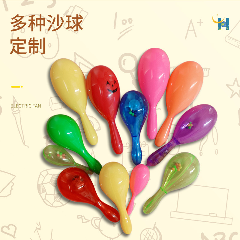 Factory wholesale a variety of transparent flash plastic sand hammer solid color plastic sand ball baby rattle toys can be printed logo