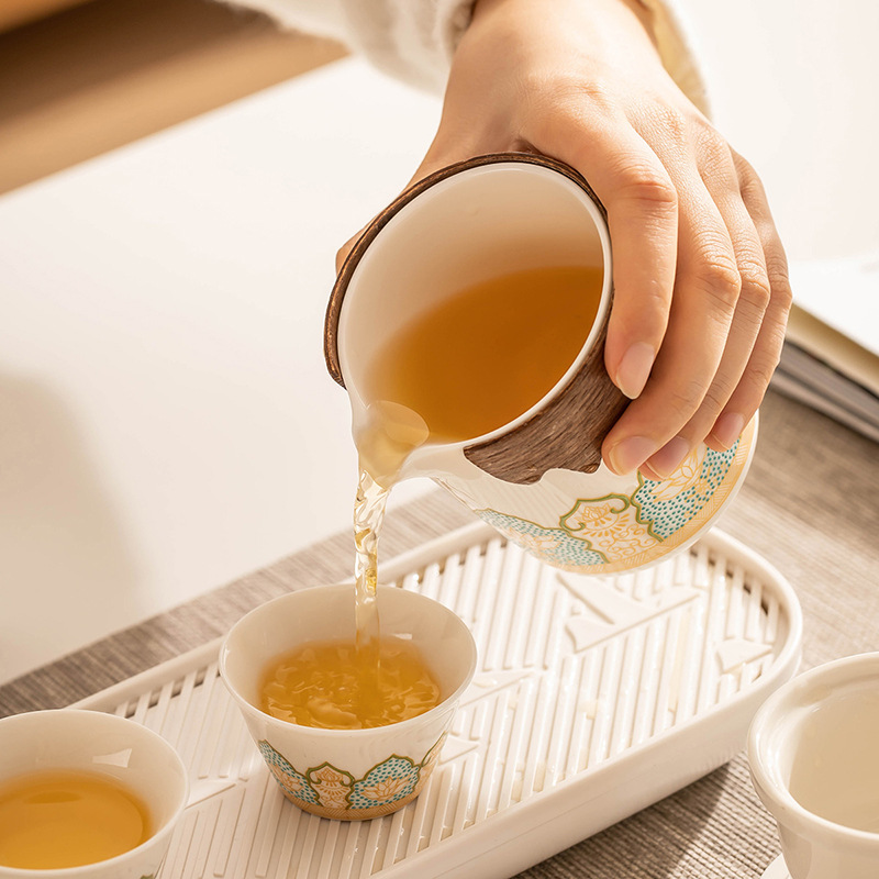 Travel tea set suit simple outdoor portable ceramic Express Cup One Pot Four Cups office kung fu teapot