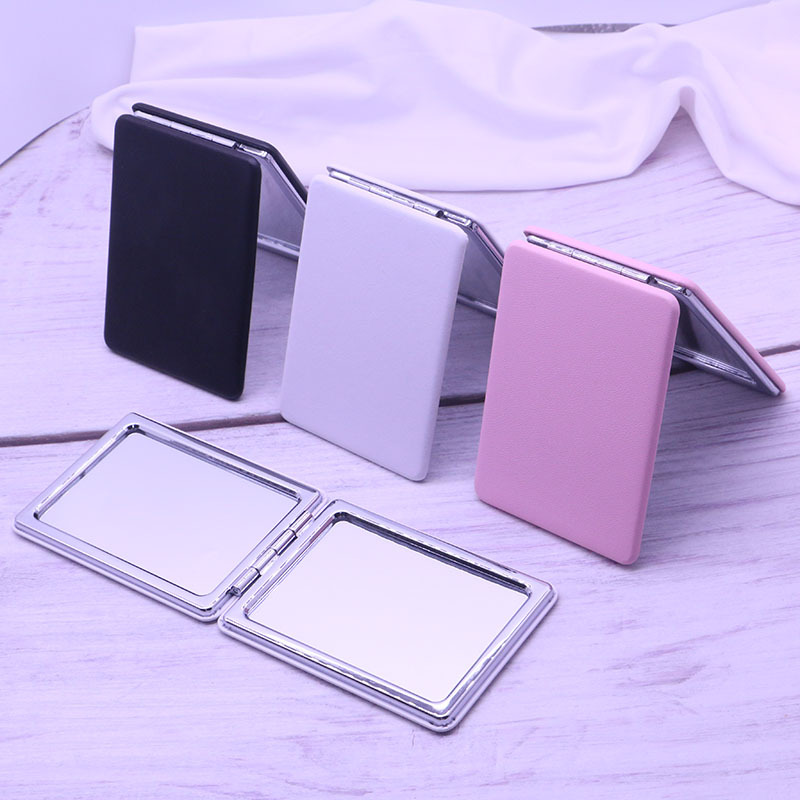 Factory Direct Supply Abs Foldableing Portable Small Mirror White Pu Leather Cosmetic Mirror Can Be Printed on Both Sides