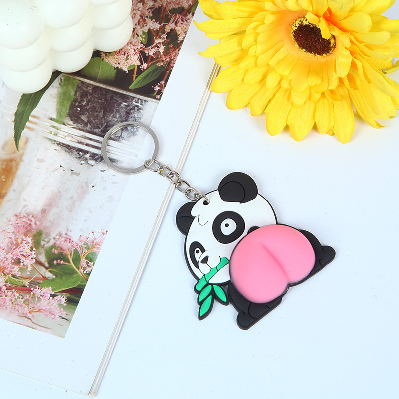 Factory wholesale peach ass vigorously refers to decompression pinch music ass keychain soft glue pink hip ornaments