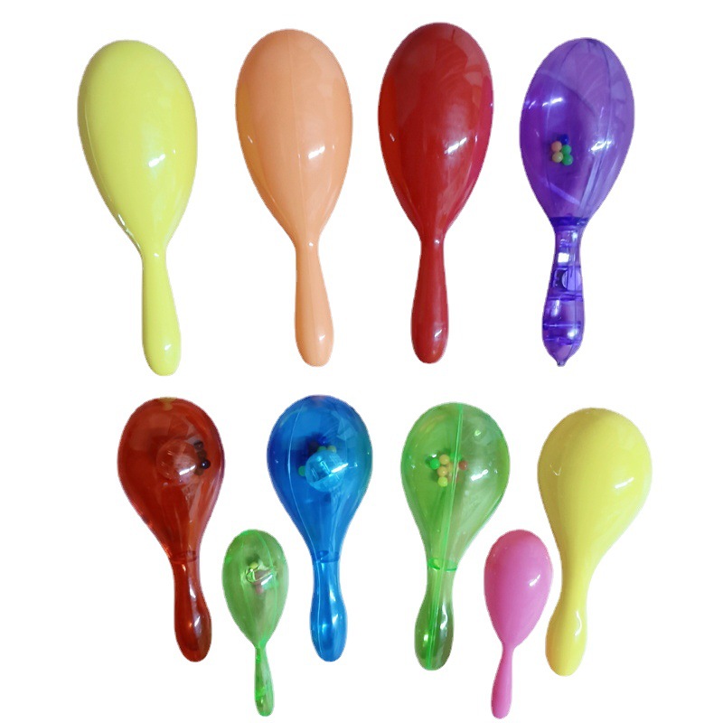 Factory wholesale a variety of transparent flash plastic sand hammer solid color plastic sand ball baby rattle toys can be printed logo