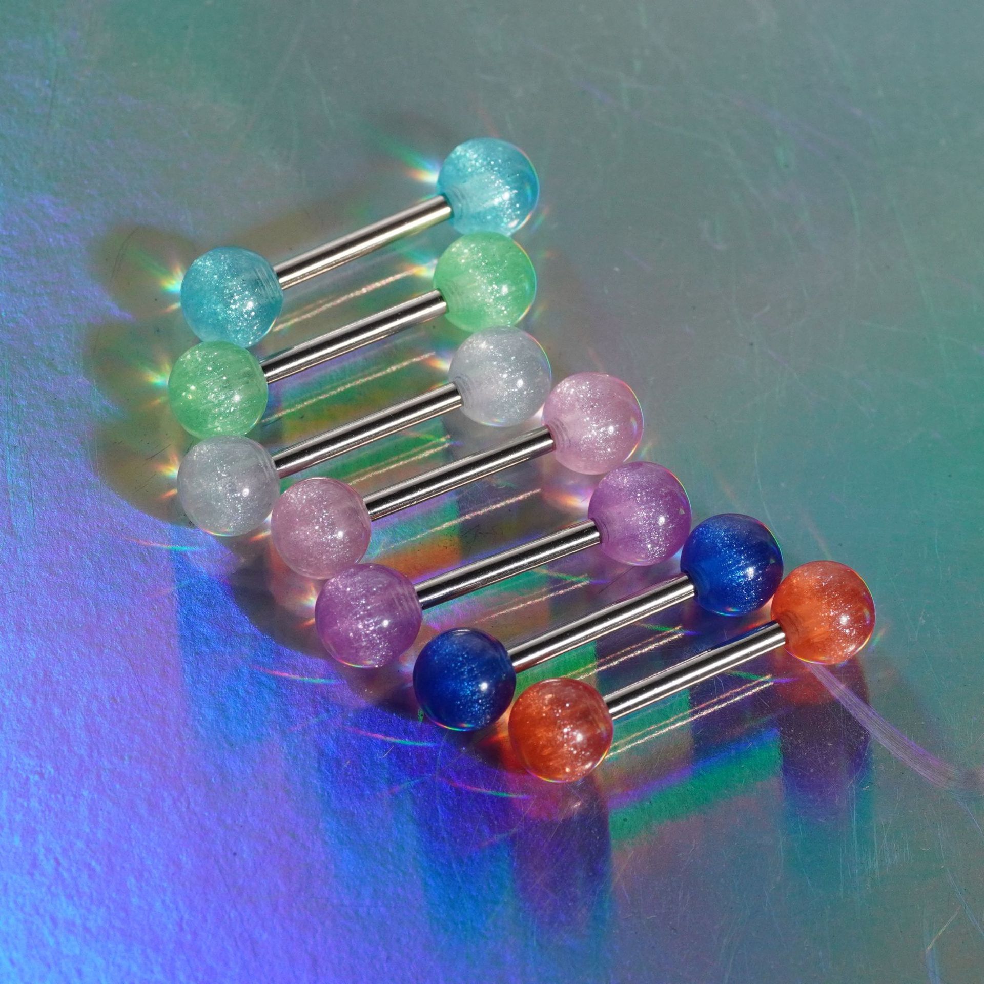 Acrylic tongue nail replacement ball 6mm accessories ball transparent color band polarized effect puncture accessories wholesale foreign trade