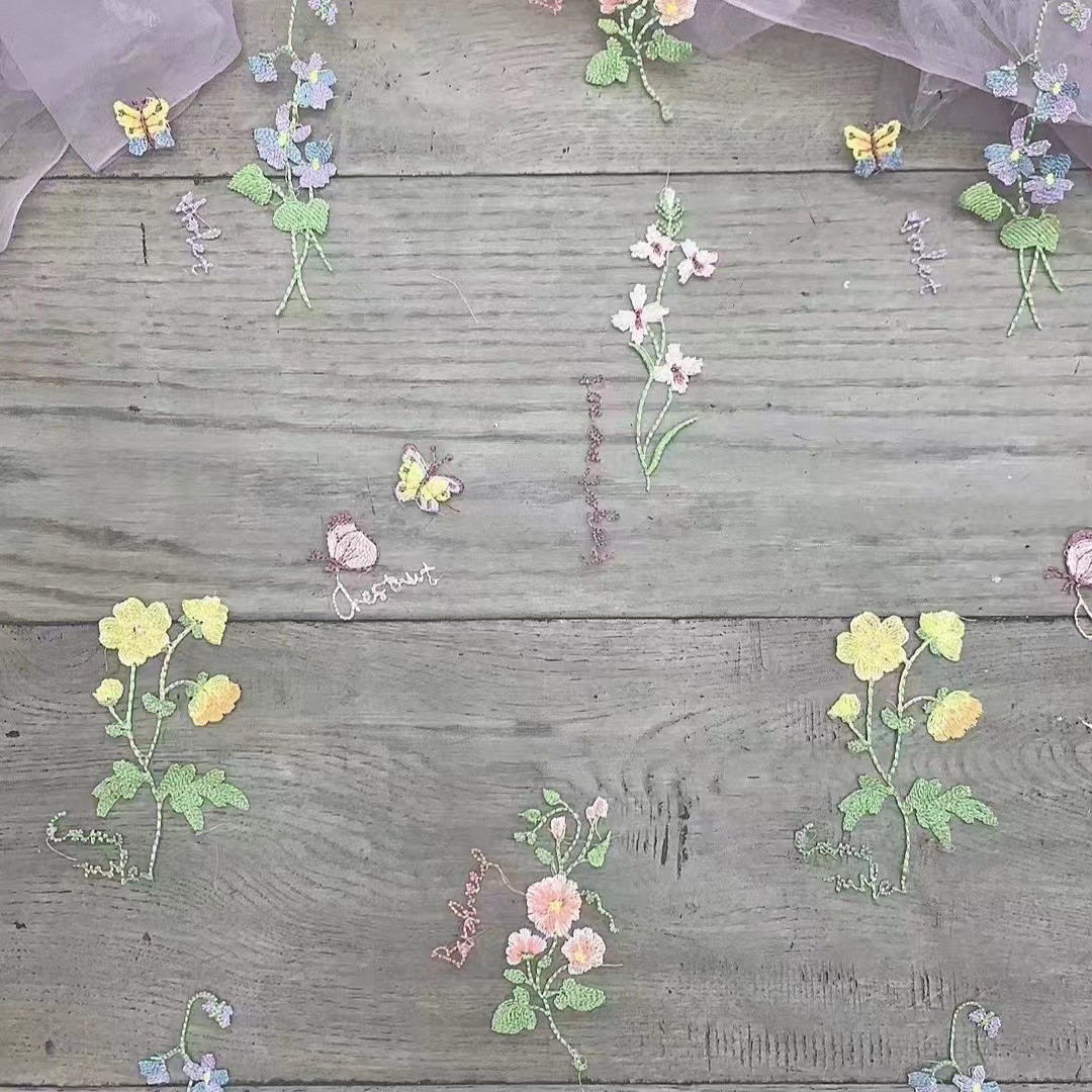 high quality Butterfly Plant Embroidery Swiss Mesh Mesh Embroidery Multicolor in stock Children's Wear Fabric