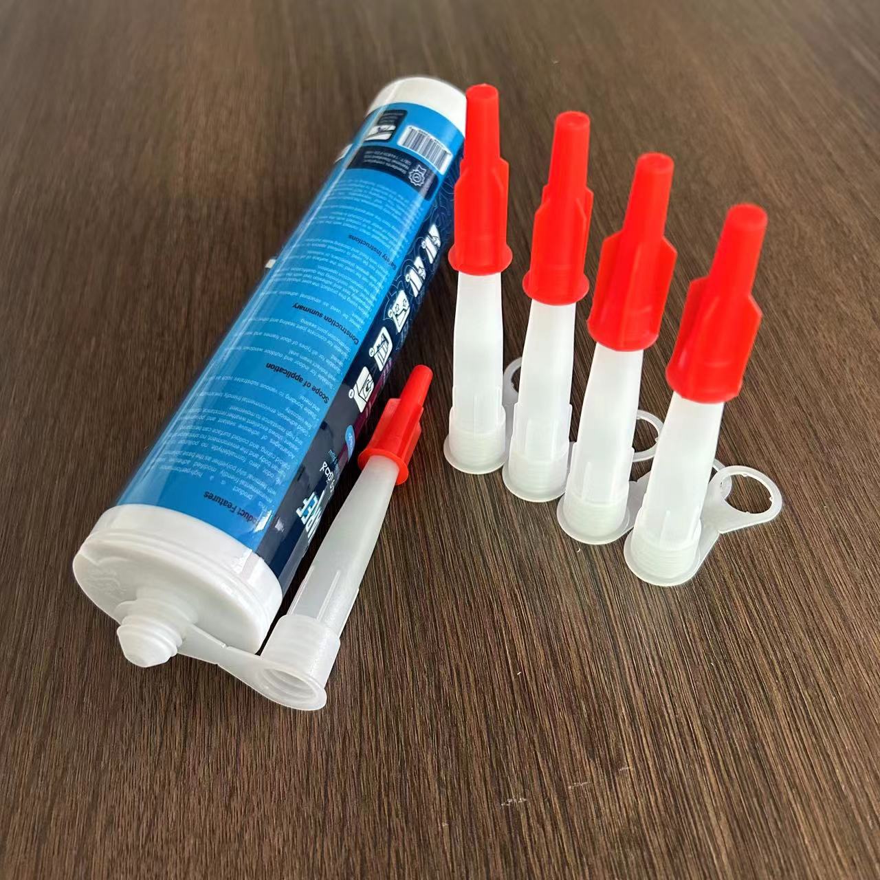 Manufacturers supply universal glass glue nozzle with Red Hat leak-proof and dry-proof hard tube glue nozzle plastic silicone glue nozzle