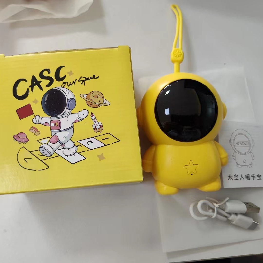 Net red astronaut hand warmer USB astronaut warm baby cartoon cat claw hand warmer wholesale electric portable belt