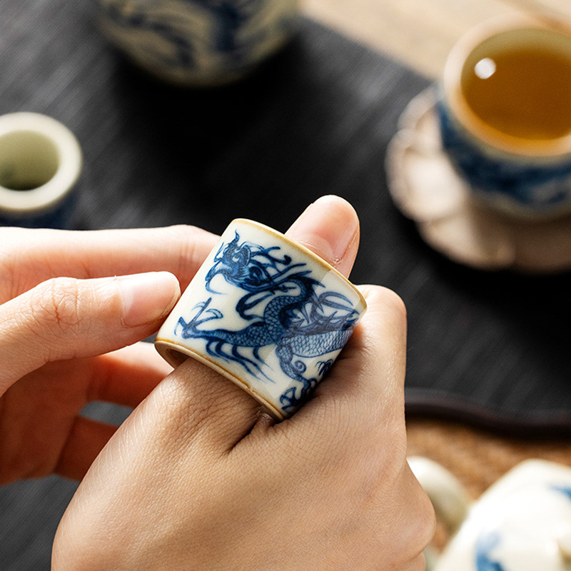 beige ru kiln yuan blue and white dragon pattern wrench cover cover cover creative kung fu tea set tea ceremony accessories tea leakage storage rack