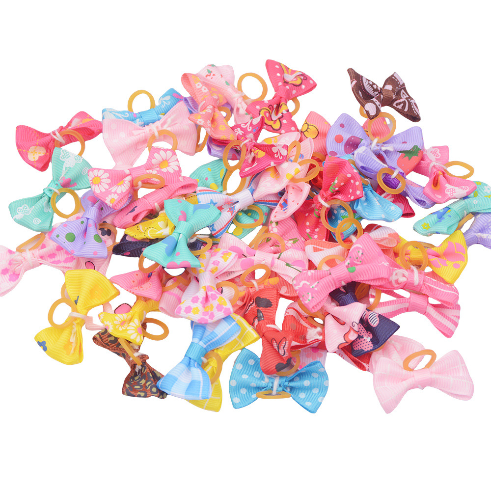 Cross-border pet dog headdress bow cat pet headdress rubber band accessories in stock multi-style mixed hair