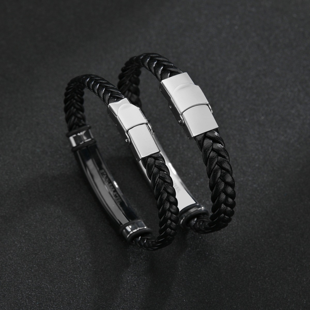 AliExpress Xiyin Explosions European and American Simple Jewelry Twist Woven Leather Bracelet Stainless Steel Bracelet Engraved LOGO