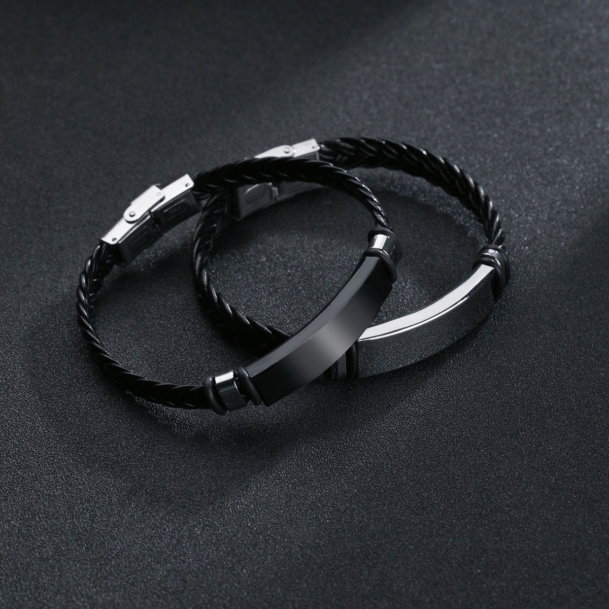 AliExpress Xiyin Explosions European and American Simple Jewelry Twist Woven Leather Bracelet Stainless Steel Bracelet Engraved LOGO